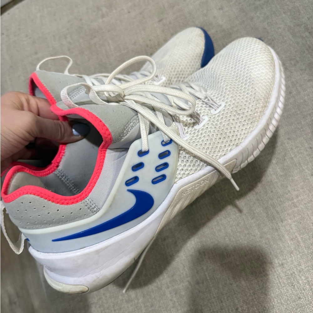 Nike Men’s White & Blue Performance Trainer with Pink Accent